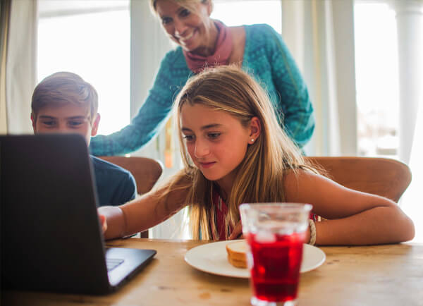Children learning at a computer
